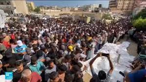 "الموت مقابل حفنة طحين" .. غزة بين فكي النار والتجويع