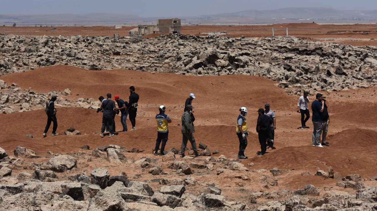 Civil Defense retrieves remains of 4 individuals from a mass grave left behind by the defunct regime in the countryside of Daraa