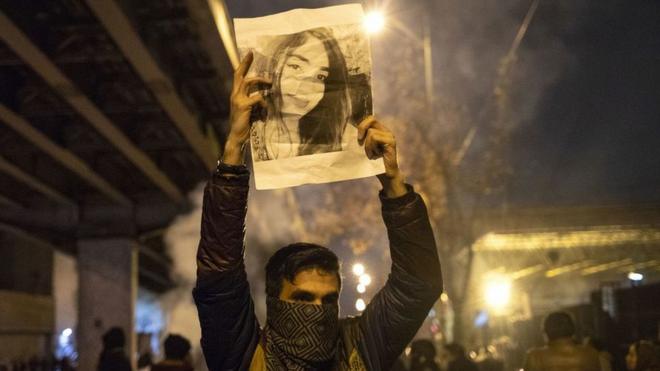 Iran Faces Ongoing Unrest Following Police Officer's Death and Calls for Continued Protests